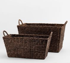 two brown baskets sitting next to each other