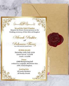 a wedding card with a wax stamp on it and a wax seal in the middle