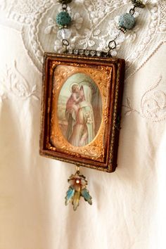 Mother Child Devotional Daguerreotype necklace assemblage | Etsy Antique Cameo Necklace For Keepsake, Antique Cameo Necklace As Keepsake, Antique Cameo Necklace Keepsake, Victorian Handmade Keepsake Necklace, Handmade Victorian Necklace For Keepsake, Antique Miraculous Medal Necklace As Gift, Antique Handmade Necklaces For Memorials, Antique Handmade Necklaces For Memorial, Mary Shrine