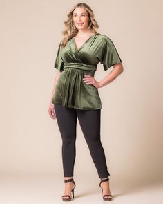 Transform your style seamlessly from day to night with the Park Avenue Velvet Top. It features a flowy silhouette, flattering ruching and playful kimono sleeves. Crafted from luxe stretch velvet, this special occasion blouse complements refined trousers or a classic pencil skirt for an elegant semi-formal wedding guest look. Pair with dark jeans for an easy going out outfit. Available in a rich olive green or romantic mauve rose, let this velvet plus size top elevate your office ensemble or be t Chic Velvet V-neck Top, Easy Going Out Outfits, Blouse And Skirt Outfit, Elegant Plus Size Outfits, Velvet Plus Size, Jumpsuit And Cardigan, Semi Formal Wedding, Going Out Outfit, Chic Cardigan