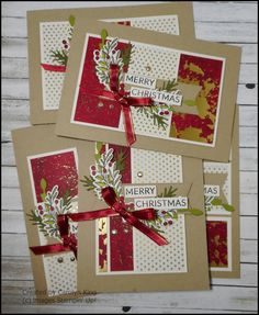 three handmade christmas cards with red ribbons