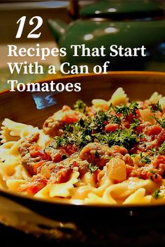 a bowl filled with pasta and meat on top of a table