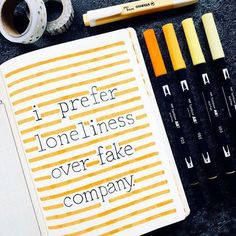 an open notebook with the words i prefer loneness over fake company