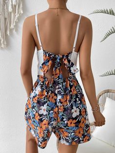 Get ready for summer with this beautiful Floral Print Contrast Lace Cami Romper! The romper features spaghetti straps, a high waistline, and a regular fit. The floral pattern is complemented by contrasting lace and scallop details, adding a touch of elegance to the outfit. To maintain its quality, machine wash with a soft detergent and avoid dry cleaning. Specifications: Pattern Type: Floral Type: Cami Details: Contrast Lace, Scallop Length: Short Fit Type: Regular Fit Neckline: Spaghetti Strap Sleeve Length: Sleeveless Waist Line: High Waist Composition: 100% Polyester Care Instructions: Machine wash, do not dry clean, wash with the soft detergent Size Chart(cm): Size US Bust Hip Size Inseam Length Waist XS 2 86 110 5.7 73.5 66-96 S 4 90 114 6 75 70-100 M 6 94 118 6.3 76.5 74-104 L 8/10 1 Jumpsuits And Rompers With Adjustable Straps For Vacation, Vacation Jumpsuits And Rompers With Adjustable Straps, Vacation Jumpsuits And Rompers With Spaghetti Straps, Spaghetti Strap Jumpsuits And Rompers For Vacation, Spring Vacation Cami Jumpsuits And Rompers, Casual Floral Print Jumpsuits With Spaghetti Straps, Summer Vacation Jumpsuits With Spaghetti Straps, Summer Vacation Spaghetti Strap Jumpsuits, Summer Floral Print Jumpsuits With Spaghetti Straps