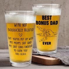 two beer glasses with funny sayings on them