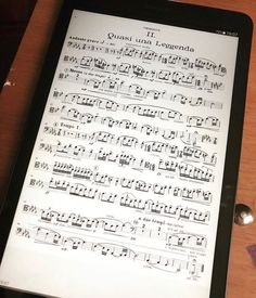 an ipad with sheet music on the screen