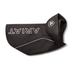 a black and white dog coat with the word vbivl printed on it