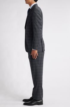 Crisp Italian wool woven in a deep, dusky plaid makes a wardrobe staple of a suit that's crafted with traditional detailing and styled to take you to any formal occasion. Jacket has notched lapels; four-button cuffs; chest pocket; flap pockets; interior pocket; side vents Trousers have zip fly with button-tab closure; slant pockets; back button-welt pockets Lined Unhemmed 99% wool, 1% spandex Dry clean Made in Italy Elegant Plaid Suit With Notch Lapel, Plaid Wool Suits For Formal Occasions, Luxury Plaid Suit For Formal Occasions, Formal Plaid Suits With Notch Lapel, Classic Plaid Suits For Formal Occasions, Classic Tailored Plaid Three-piece Suit, Timeless Plaid Suits For Formal Occasions, Plaid Notch Lapel Suit For Formal Occasions, Tailored Plaid Suit For Semi-formal Occasions