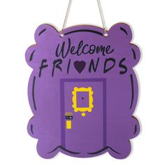 a purple sign that says welcome friends with a yellow bear on the front and back