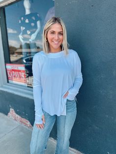 Stay cozy and chic in our River Open back Knit Top. This ribbed, oversized top features a boat neck and long sleeves with thumb holes for added style and comfort. The high low curved hemline adds a playful touch. Available in White or Sage Green, made from a soft blend of 60% Polyester, 35% Rayon, and 5% Spandex. Oversized Top, Stay Cozy, Thumb Holes, Large White, Boat Neck, Sage Green, High & Low, Open Back, High Low