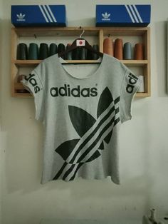 TAG BRAND -Adidas Made in Japan MATERIAL - Cotton CONDITION- preowned/vintage Condition ACTUAL SIZE / MEASUREMENT( while laying flat.) Length - 26 inches Armpit to armpit - 21 inches Please compare the measurement with your garment before buying. Kindly read my shipping and policies. Thanks for dropping by. Have a nice day. Cheap Adidas Tops With Logo Print, Ladies Sweatshirt, Adidas Vintage, Adidas T Shirt, Vintage Hoodies, Vintage Adidas, Made In Japan, Sweatshirts Women, Sweat Shirt