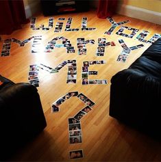 the floor is covered with photos and letters that spell out what's on it