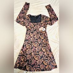 Known Supply Dress Color: Dark Blue Paisley Style: Sonnet Sizes: Multiple Square Neck Line High Waist Line 100% Organic Cotton Gots Fair Trade Certified Small: Put To Pit: 15” Waist: 13” Waist To Hem: 22” Total Length: 35” Large: Put To Pit: 18.5” Waist: 15.5 Waist To Hem: 23” Total Length: 35.5” Brand New With Tags Imported Fall Paisley Print V-neck Dress, Paisley Print V-neck Patterned Dress, Spring Paisley Print V-neck Midi Dress, Patterned Paisley Print V-neck Dresses, Spring Paisley Print Boho V-neck Dress, Paisley Fashion, Blue Paisley, Square Neck, Fair Trade