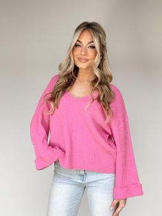 This Delightful Knit Sweater is the perfect addition to your wardrobe. Featuring a v neckline and ribbed detailing, this garment is luxuriously crafted with textured ultra-stretchy softness. Noticeably bright, cozy and relaxed fit, with bell sleeves, this sweater is perfect for an elevated casual brunch date, shopping, dinner, or work wear. Classy and sophisticated, it is a timelessly versatile piece. 50% Acrylic 30% Nylon 20% Cotton Hand wash cold. Solid Ribbed V-neck Knit Top, Soft Knit V-neck Top, Soft Knit V-neck Sweater For Spring, Chic Knit V-neck Sweater With Ribbed Neckline, Spring V-neck Soft Knit Stretch Sweater, Pink Textured Knit V-neck Sweater, Spring V-neck Stretch Sweater, Stretch Ribbed V-neck Sweater, Stretch V-neck Sweater With Ribbed Neckline