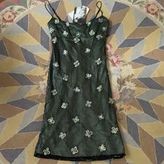 Vintage Betsey Johnson Midi Dress Perfect For A Cocktail Party Gorgeous Condition, New With Tags Amazing Silhouette Size 4, Fits A 2 / 4 / S Ribbon And Rosette Detailing Green Iridescent Mermaid Vibes Adjustable Straps Low Cut Sexy For Reference, I’m Modeling - I’m 5’1”, 28” Waist, 30d Chest. It Fits Me Very Well. I Wouldn’t Go Larger In The Waist. You Can Go A Tiny Bit Larger In The Chest But Not Much. Would Look Great On Someone Petite Or Someone Tall! Fitted Midi Dress For Festive Occasions, Festive Fitted Midi Dress, Y2k Style Sleeveless Evening Dresses, Y2k Style Green Mini Dress, Y2k Green Mini Dress, Green Y2k Style Mini Dress, Green Y2k Mini Dress, Green Y2k Style Summer Dress, Fitted Y2k Mini Dress For Evening