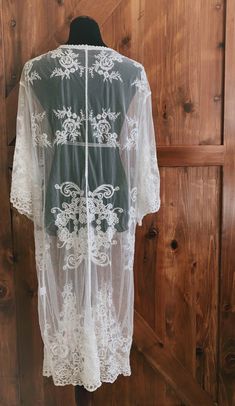 "An overlayering piece made with soft embroidered sheer lace. Makes for a super sweet cover up for any outfit! ONE SIZE FITS MOST - SMALL, MEDIUM, LARGE, XL Length: 46\" Bust: 24\" flat measure (tie front, one size fits all) Armhole: 14\" Get two items or more and your shipping is on us! Enter code FREESHIP at checkout! (US shipping only)" White Lace Jacket, Lace Duster, Cardigan Fits, Kimono Boho, Boho Mode, Sheer Kimono, West Covina, Bridal Robe, Cardigan White