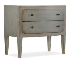 an old grey dresser with two drawers