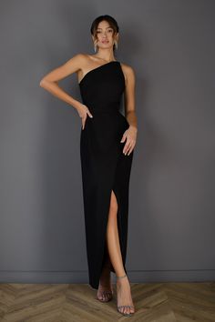 Fabric: Crepe Cotton 75%, Polyester 20%, Elastane 5% Asymmetric neckline One shoulder Sleeveless dress Bodycon fit Zipper lock at the side Thigh slit Maxi length Black Tie Wedding Guest Dress Spring, Black Gala Dress, Shawl Lapel Suit, Formal Attire Women, Wedding Guest Dress Inspiration, Black Tie Wedding Guest Dress, White Shawl, Zipper Lock, Black Tie Wedding Guests