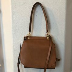 Wore This For New York Fashion Week, But Is Otherwise Brand New. Has A Studded Handle And Long Strap That Is Detachable. It Also Opens On Both Sides As Shown In Last Photo Versatile Saddle Bag With Gold-tone Hardware For Everyday, Versatile Brown Saddle Bag, Chic Tan Hobo Bag For Everyday, Nine West Bags, New York Fashion Week, Nine West, New York Fashion, Saddle Bags, Both Sides