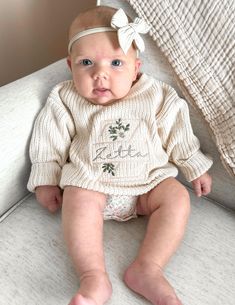 Every babe needs one of these oversized, embroidered name sweater. Each one is custom made with desired swester color, thread color and selected name and initial. These name sweaters would be great for baby announcements, family pictures, first birthdays or as a gift! Each one is truly one of a kind, being embroidered unique to your babe. Available in size 3-6 months to 5T.  Production and shipping can take up to 2 weeks. If the product is needed sooner, please send me a message to see if we can Embroidered Cream Cotton Sweater, Cream Cotton Embroidered Sweater, Cream Embroidered Cotton Sweater, Cute Cream Cotton Sweater, Cute White Sweater With Custom Embroidery, White Cute Sweater With Custom Embroidery, White Sweater With Custom Embroidery, Cute Cotton Sweater For Birthday, Cute Cotton Sweater With Floral Embroidery