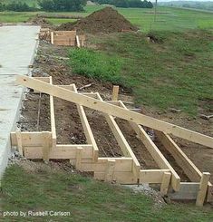 some wooden beams are laying on the ground