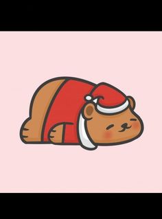 a brown bear wearing a santa hat sleeping on top of it's back with its eyes closed