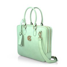 a mint green purse with two handles and a gold monogrammed letter on the front