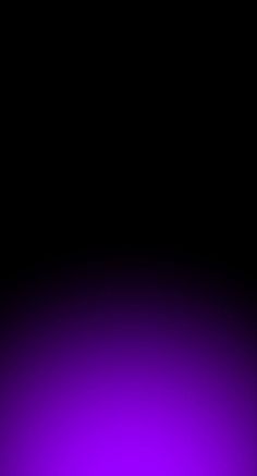 a black and purple background with an orange light