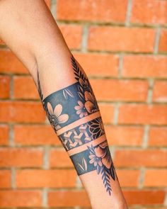 a person with a tattoo on their arm