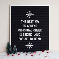 the best way to spread christmas cheer is singing loud for all to hear on this sign