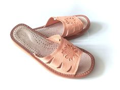 "Women's natural leather slippers / sandals Traditional stamping patterns highlander Unique women's natural leather slippers / sandals - Traditional stamping patterns highlander Thick, delicate genuine leather with beautiful patterns - traditional highlander style. The sole is made of foam, about +/-2 cm  Made in limited quantities - perfect for summer, comfortable, light and unique * NOTE: I recommend exact measuring your foot in \"cm\" or \"inches\" and selecting the size on this basis ( see t Comfortable Orange Slip-on Sandals, Comfortable Open Toe Slippers In Natural Color, Comfortable Open Toe Natural Slippers, Comfortable Orange Slide Sandals, Non-slip Leather Slippers For Spring, Beige Non-slip Clogs For Summer, Beige Non-slip Summer Clogs, Brown Open Toe Slippers For Outdoor, Orange Open Toe Slippers For Spring