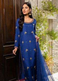 Beautiful navy blue long silk suit has embroidery of zardozi, zari and sequin, small motifs all over the front,back and sleeves. It has beautiful net dupatta with small motifs all over. This dress will be fully cotton lining.  ✨This outfit is perfect of this festive season, wedding function and party.  ✨We do not deal with replica. These  are all custom made dress as per our customers choice and measurements.  ✨If you want any changes in the outfit people contact us we will guide you as per your preference. ✨We assure you that we use only high quality fabric and threads to make any dress and you won't face any problem regarding fabric.  ✨Sometimes we take little longer time manufacturer the outfit as all are dresses are custom made on order. We take utmost care while manufacturing so that Sheer Dupatta, Blue Dupatta, Organza Suits, Kurtis With Pants, Silk Set, Net Dupatta, Straight Trousers, Sequins Embroidery, Party Wear Dresses