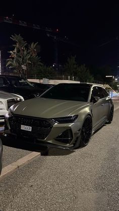 two cars parked next to each other on the street