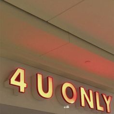 a neon sign that says 4 u only on it