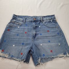 No Boundaries Nobo Cute Shorts Perfect For The Summer And Fourth Of July. Light Distressing On The Cuff Hem, No Holes. Red, White And Blue Stars Embroidery On The Front Of The Shorts. Back Does Not Have Stars. Nwot, New With Out Tags Size 9 72% Cotton, 22% Rayon, 1 % Other Fabric Copper Color Zipper And Button. Denim Blue Summer Bottoms With Star Print, Summer Denim Blue Star Print Bottoms, Blue Star Print Short Bottoms, Blue Shorts With Star Print, Blue Star Print Shorts, High Waist Star Print Summer Jeans, Summer High Waist Star Print Jeans, High Waist Star Print Jeans For Summer, Summer High-waist Star Print Jeans