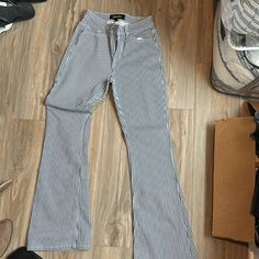 Brand New Never Worn. Size 7/27 Flare Pinstripe Denim Striped Straight Leg Denim Jeans, Casual High Waist Pinstripe Pants, Trendy High Waist Striped Pants, Trendy High-waist Striped Pants, Trendy Denim Bottoms With Vertical Stripes, Striped Mid-rise Denim Jeans, High Waist Pinstripe Cotton Bottoms, Trendy High Waist Pinstripe Bottoms, Casual Striped Straight Leg Jeans