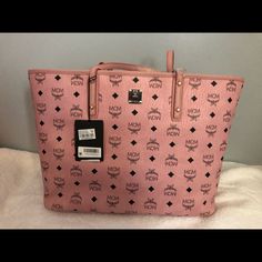 This Is 1, Pink Brand New Pink Mcm Tote Bag With Tags On It! This Is 100 Percent Authentic Mcm Purse! The Size Is 15 In X 11.5 X 3.5 In ! It Includes The Card That You Could Put The Serial Number On ! There Is Also A Dusk Bag Which Is Included! I Will Include A Free Small Mcm Pink Purse ! Therefore You Will Get Two Items That Are 100 Percent Authentic ! High-end Pink Shoulder Bag, Pink Mcm Bag, Mcm Tote Bag, Pink Mcm, Mcm Purse, Wow Mom, Dream Bag, Mcm Bags, Pink Purse