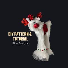 an animal made out of white fur with red flowers on its head and the words diy pattern & tutorial blur designs