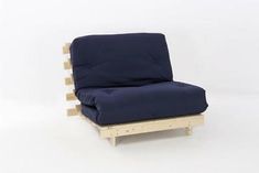 a chair made out of pallet wood and blue fabric