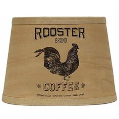 a lamp shade that has a rooster on the front and coffee beans on the back