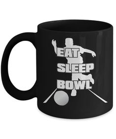 a black coffee mug with the words eat sleep bowl on it and an image of a man