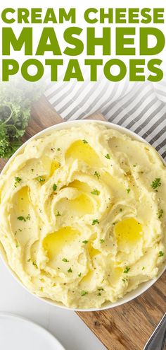 mashed potatoes in a white bowl with parsley on top and text overlay that reads cream cheese mashed potatoes