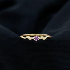 Product Details Embrace a promise of eternal love with this enchanting Promise Ring. The captivating centerpiece of this sparkling ring is a Round Shape Amethyst gemstone, delicately set in a prong setting. The Leaf Branch inspired band is adorned with shimmering Diamond gems, adding a touch of elegance and sophistication. This ring exudes a sense of class and grace, making it a perfect symbol of your commitment. Product Information SKU SHP-RINGS0821209718 Width 2.9 mm Height 3.7 mm Weight 1.52 gm (Approximate) AMETHYST INFORMATION No.of Stones 1 Pieces Total Weight 0.45 Carat (Approximate) Dimension(approx) Round-5X5 mm-1 Pcs Color Voilet Cut Brilliant Shape Round Setting Type Prong-Setting Quality Grade AAA DIAMOND INFORMATION No.of Stones 6 Pieces Total Weight 0.02 Carat (Approximate) D Elegant Amethyst Crystal Ring With Accent Stones, Elegant Amethyst Crystal Ring With Center Stone, Elegant Amethyst Crystal Ring With Gemstone Accents, Elegant Amethyst Crystal Ring With Prong Setting, Elegant Amethyst Birthstone Ring With Prong Setting, Elegant Purple Crystal Promise Ring, Elegant Amethyst Birthstone Ring For Promise, Fine Jewelry Amethyst Crystal Promise Ring, Fine Jewelry Amethyst Crystal Ring For Promise