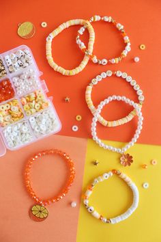 Make your own set of stretchy yellow, orange, and white bracelets with a kit that includes all the supplies you need! This is the perfect gift or a fun craft for a party, sleepover, or girls night! Makes at least 6 adult-sized bracelets. This kit includes: 1 Plastic box Clay, pearl, spacer, and assorted letters beads Orange and flower charms Stretch cord Instructions (will be emailed once you complete your order) Add a custom word to your kit by clicking here. Product will ship 4-5 business days Party Sleepover, Jewelry Kit, Diy Jewelry Kit, Jewelry Kits, White Bracelets, Fun Craft, Letter Beads, Flower Charm, Yellow Orange