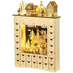 a wooden christmas scene is shown in the shape of a cabinet with drawers and lights