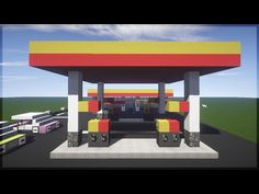 an image of a gas station that is in the middle of a parking lot with cars parked around it