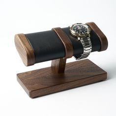 This men's wristwatch stand is made of solid American black walnut. This watch pillow is made of upholstery fabric. Soft felt pads are glued to the bottom of the watch holder. Dimensions of watch organizer: 165mm * 80mm * 110mm ( 6 1/2'' x 3 1/7'' x 4 1/3'' ) I can personalize this wooden watch stand, engrave any text, name, or initials. You can also choose a font for engraving (any font available in Windows 10). Personalization will take 1 to 2 days. Shipping Once payment is received, items wil Wooden Watch Stand, Watch Organizer, Watch Stand, Watch Holder, American Black Walnut, Soft Pillow, Wooden Watch, Watch Box, Soft Pillows