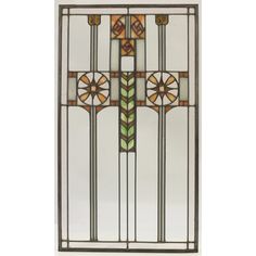 an art deco stained glass window with geometric designs on the top and bottom panel,