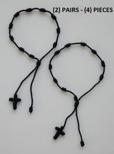 "QUANTITY: 4 pieces LENGTH: Adjustable from 6\" - 8\". MATERIAL: Made with nylon cord. CROSS: Made with woven cord 5/8\" x 7/16\". In case that you have a big wrist, this cord rosary bracelet can be easily stretched by pulling the cord a little at a time so that it will fit you properly. This is a very economic, good quality and practical rosary that you can take on your wrist anywhere. Come Visit Us at Our New Store! Please feel free to email me with questions about this item.  Also please chec Rosary Bracelet, Rosary, Charms, Feel Free, Bracelet, Etsy Uk, Quick Saves, Black