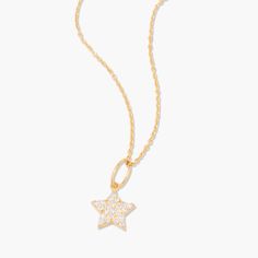 Get ready to shine with the Adeline Star Vermeil Necklace! This stunning necklace features a gold vermeil pendant in the shape of a star. Perfect for adding a touch of sparkle to any outfit, this necklace is the star of any jewelry collection! Available in 14k gold vermeil 3/8" star charm with 1.5mm white topaz 18" cable chain with 2" extender Lobster claw closure SKU: BYN1496 Fine Jewelry Star Charm Pendant Necklace, Fine Jewelry Star Of David Necklace With Star Charm, Gold Starburst Necklace With Star Charm, Yellow Gold Charm Necklace With Star Of David Charm, 14k Gold Star Charm Necklaces, Yellow Gold Pendant Necklace With Star Charm, Yellow Gold Star Charm Pendant Necklace, Yellow Gold Star Necklaces With Starfish Charm, Tennis Jewelry